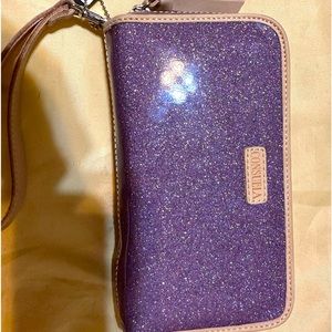 Consuela wristlet with tags never used